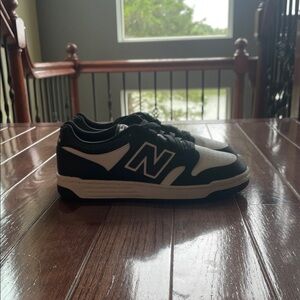 New Balance Women’s Black and White Sneakers